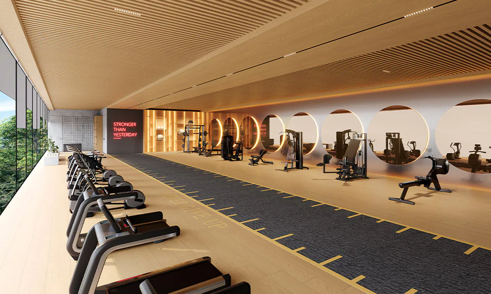 Gymnasium with a run track and glazed wall at Rustomjee Urban Woods